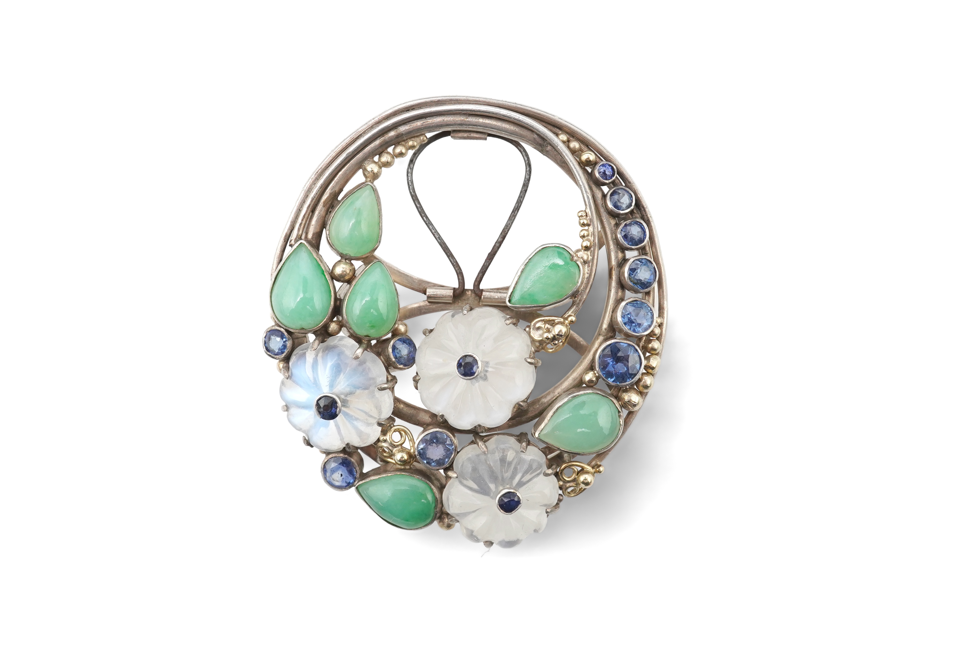 Attributed to Dorrie Nossiter (1893-1977), an Arts & Crafts moonstone, sapphire and jadeite scarf clip, 1920s